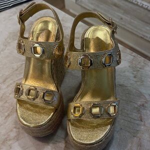 Authentic Larroude gold wedge